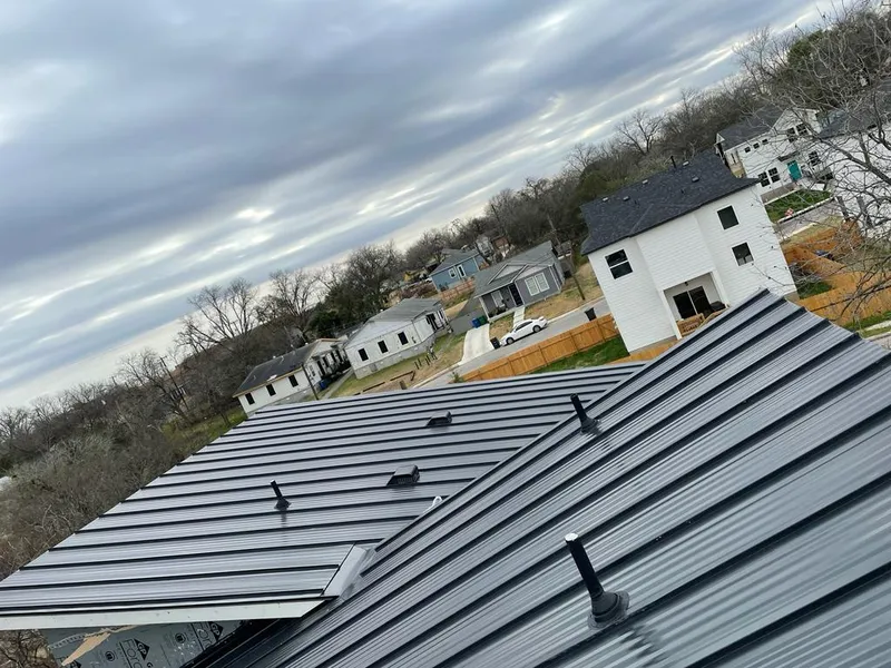 Standing seam metal roof panels with vents for Skylight Repair in North Olmsted